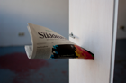 „Begrenzung”, 2013,           40x45x165cm, newspapier, colored aluminium, colored wood